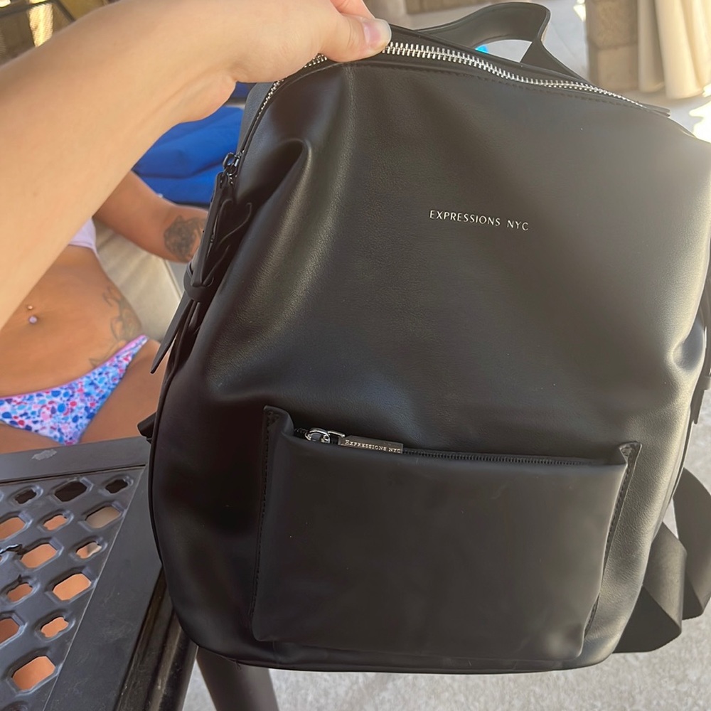 Black hand bag/ backpack